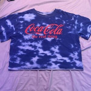 A blue tie dye Coca Cola pajama shirt